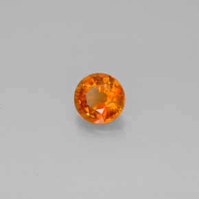 Clinohumite Jaune orange naturelle Coupe roude, 0.64 ct, SI