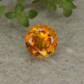 Clinohumite Jaune orange naturelle Coupe roude, 0.62 ct, VS-SI