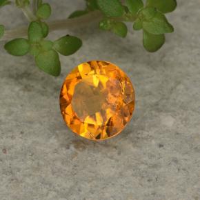 Clinohumite Jaune orange naturelle Coupe roude, 0.62 ct, VS-SI