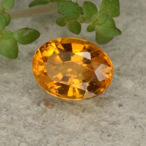 Clinohumite orange naturelle coupe ovale, 0,84 ct, VS-SI