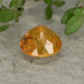 Clinohumite Jaune orange naturelle Coupe roude, 0.85 ct, VS-SI