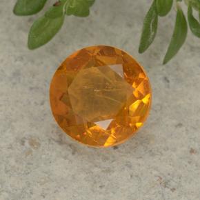 Clinohumite Jaune orange naturelle Coupe roude, 1.26 ct, VS-SI