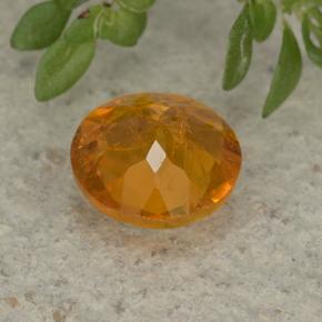 Clinohumite Jaune orange naturelle Coupe roude, 1.26 ct, VS-SI