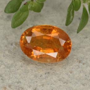 Clinohumite Jaune orange naturelle Coupe ovale, 1.05 ct, VS-SI