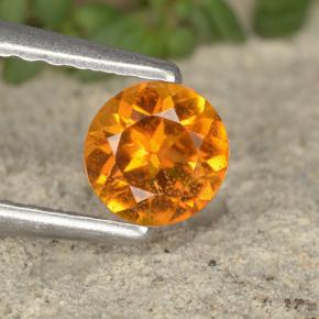 Clinohumite Jaune orange naturelle Coupe roude, 0.38 ct, VS-SI