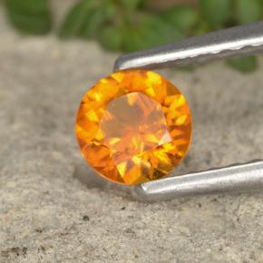 Clinohumite Jaune orange naturelle Coupe roude, 0.38 ct, VS-SI