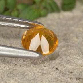 Clinohumite Jaune orange naturelle Coupe roude, 0.38 ct, VS-SI