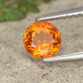 Clinohumite orange jaunâtre naturelle coupe roude, 0,55 ct, VS-SI