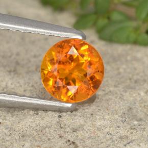 Clinohumite orange naturelle coupe roude, 0,49 ct, VS-SI