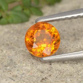 Clinohumite orange naturelle coupe roude, 0,49 ct, VS-SI
