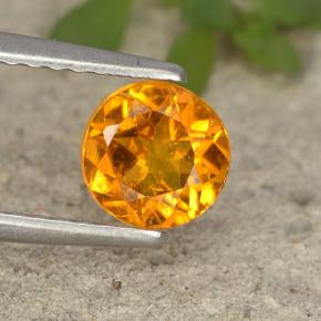 Clinohumite Jaune orange naturelle Coupe roude, 0.80 ct, VS-SI