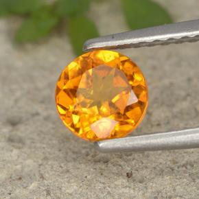 Clinohumite Jaune orange naturelle Coupe roude, 0.80 ct, VS-SI