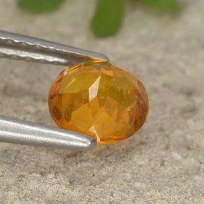 Clinohumite Jaune orange naturelle Coupe roude, 0.86 ct, VS-SI