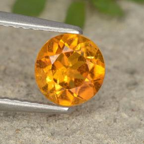 Clinohumite Jaune orange naturelle Coupe roude, 0.87 ct, VS-SI