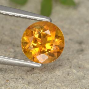 Clinohumite Jaune orange naturelle Coupe roude, 0.75 ct, VS-SI