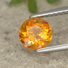 Clinohumite Jaune orange naturelle Coupe roude, 0.75 ct, VS-SI