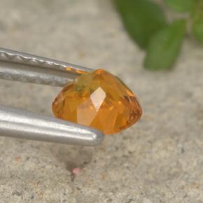 Clinohumite orange naturelle coupe roude, 0,46 ct, VS-SI