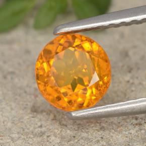 Clinohumite orange naturelle coupe roude, 0,94 ct, VS-SI