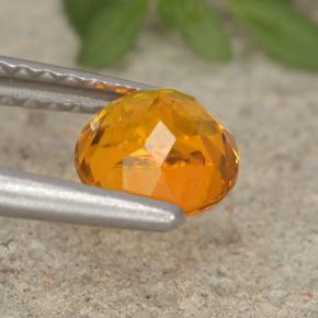 Clinohumite orange naturelle coupe roude, 0,94 ct, VS-SI