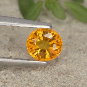 Clinohumite Jaune orange naturelle Coupe ovale, 0.41 ct, VS-SI