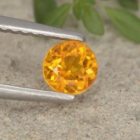 Clinohumite Jaune orange naturelle Coupe roude, 0.37 ct, VS-SI