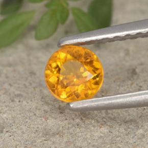 Clinohumite Jaune orange naturelle Coupe roude, 0.37 ct, VS-SI