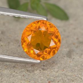 Clinohumite orange naturelle coupe roude, 0,95 ct, VS-SI