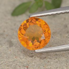 Clinohumite orange naturelle coupe roude, 0,95 ct, VS-SI