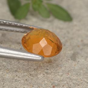 Clinohumite orange naturelle coupe roude, 0,95 ct, VS-SI