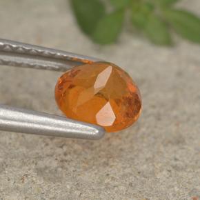 Clinohumite orange naturelle coupe roude, 0,93 ct, VS-SI