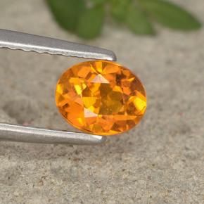 Clinohumite orange naturelle coupe ovale, 0,62 ct, VS-SI