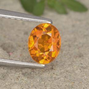 Clinohumite orange naturelle coupe ovale, 0,62 ct, VS-SI