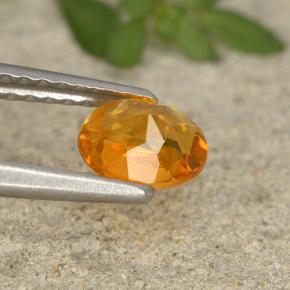 Clinohumite orange naturelle coupe ovale, 0,62 ct, VS-SI