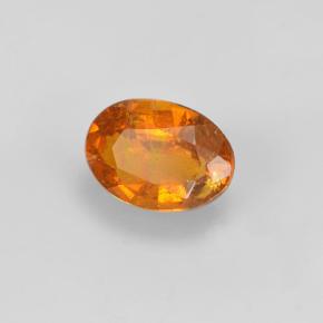 Clinohumite Jaune orange naturelle Coupe ovale, 1.05 ct, VS-SI