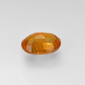 Clinohumite Jaune orange naturelle Coupe ovale, 1.05 ct, VS-SI