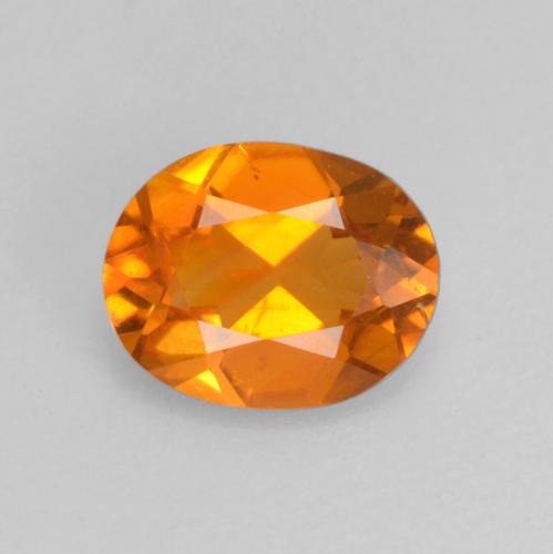 Clinohumite orange naturelle coupe ovale, 0,52 ct, VS-SI