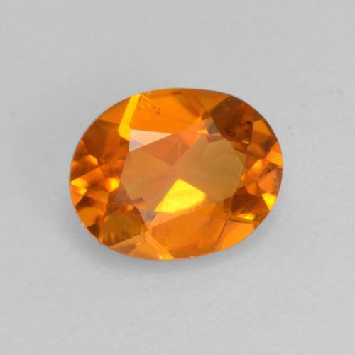 Clinohumite orange naturelle coupe ovale, 0,52 ct, VS-SI