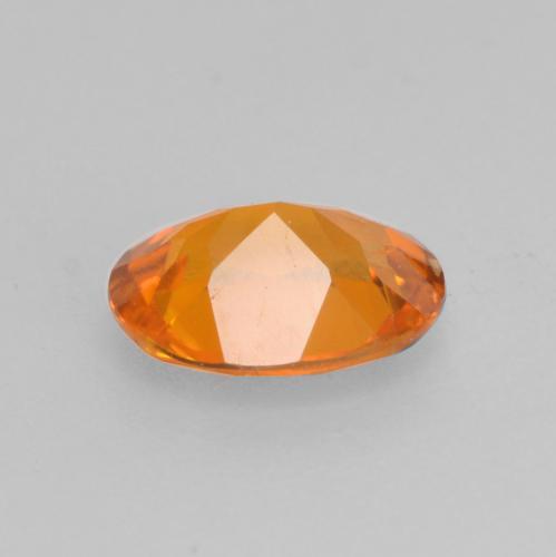 Clinohumite orange naturelle coupe ovale, 0,52 ct, VS-SI