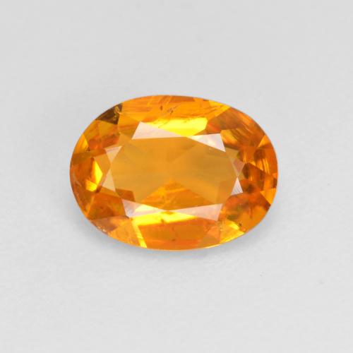Clinohumite Abricot orange naturelle Coupe ovale, 0.99 ct, VS-SI