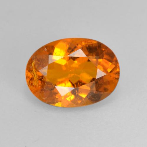 Clinohumite orange naturelle coupe ovale, 0,82 ct, SI