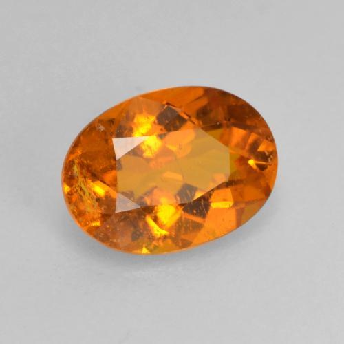 Clinohumite orange naturelle coupe ovale, 0,82 ct, SI