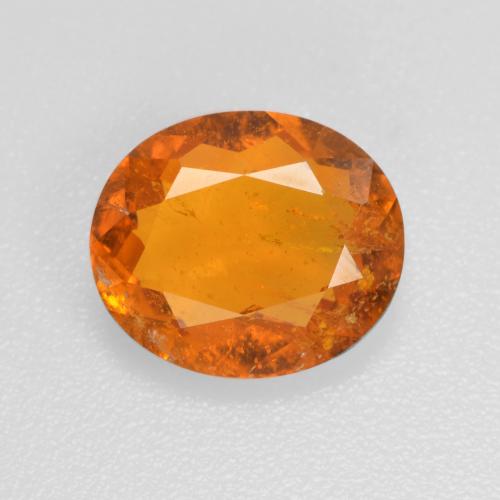 Clinohumite orange naturelle coupe ovale, 1,45 ct, SI