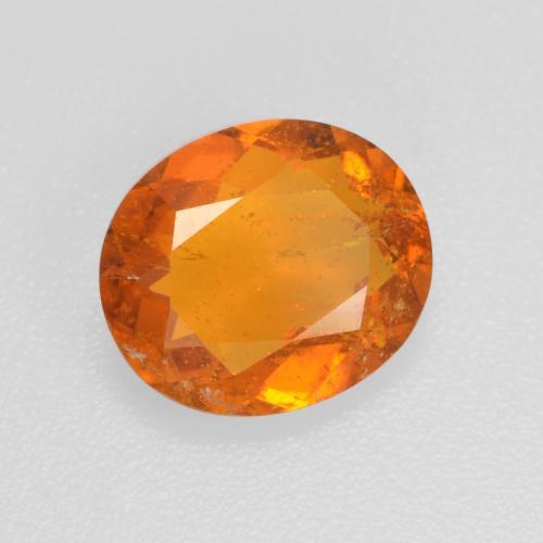Clinohumite orange naturelle coupe ovale, 1,45 ct, SI