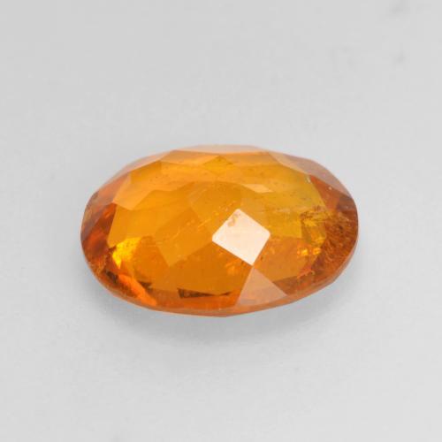 Clinohumite orange naturelle coupe ovale, 1,45 ct, SI