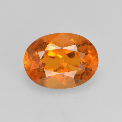 Clinohumite orange naturelle coupe ovale, 1,21 ct, SI