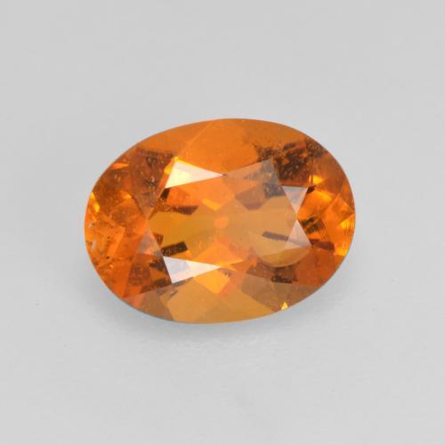 Clinohumite orange naturelle coupe ovale, 1,21 ct, SI