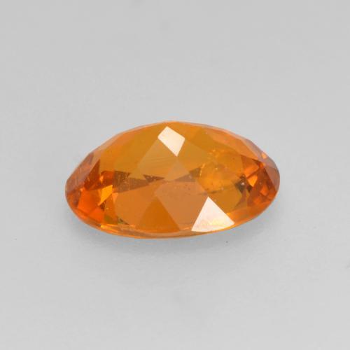 Clinohumite orange naturelle coupe ovale, 1,21 ct, SI