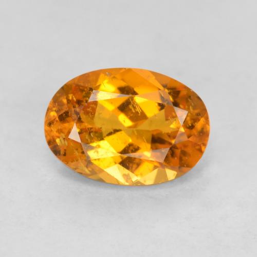 Clinohumite orange naturelle coupe ovale, 0,85 ct, SI-I1