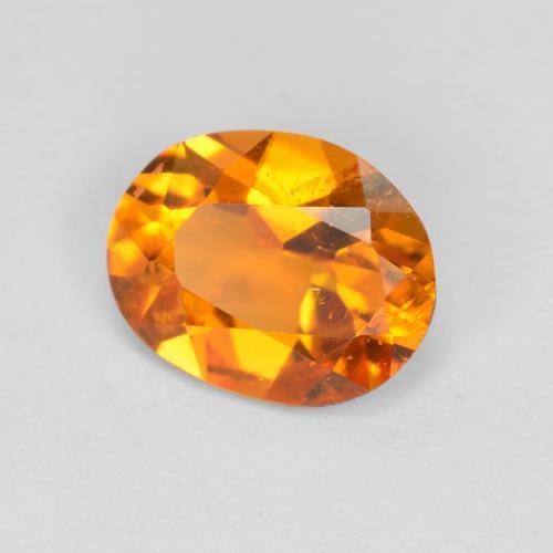 Clinohumite orange naturelle coupe ovale, 0,68 ct, SI