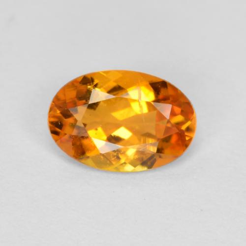 Clinohumite Abricot orange naturelle Coupe ovale, 0.43 ct, SI